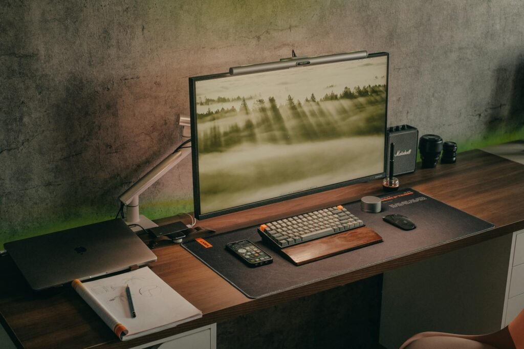 An under-desk cable tray holding power and data cables neatly off the floor