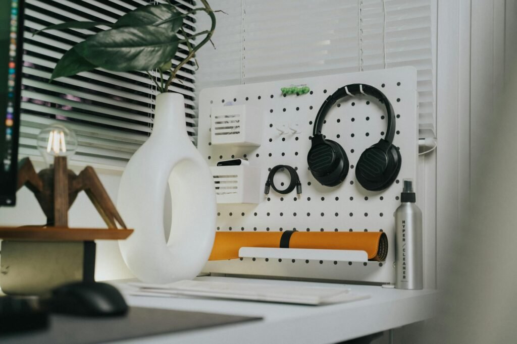 A close-up of practical desk organization tools mounted neatly under a desk