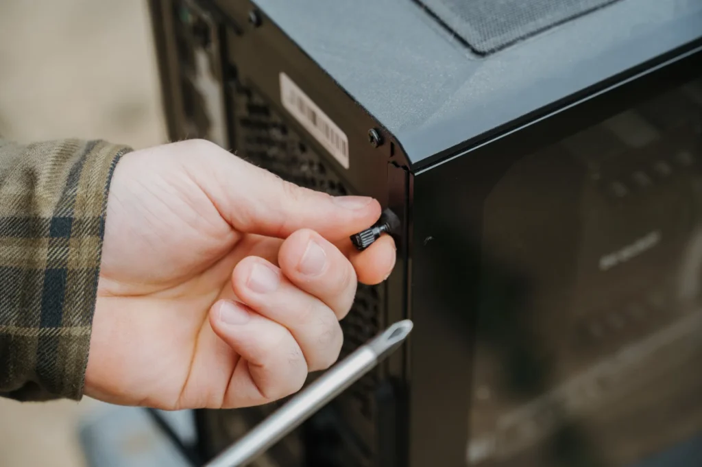 A close-up showing dust collected on a desktop PC’s front mesh filter.