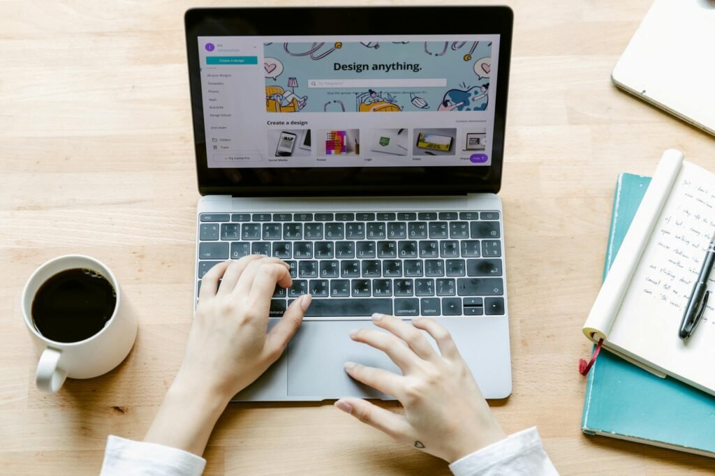Hands using a laptop while checking a handwritten setup list