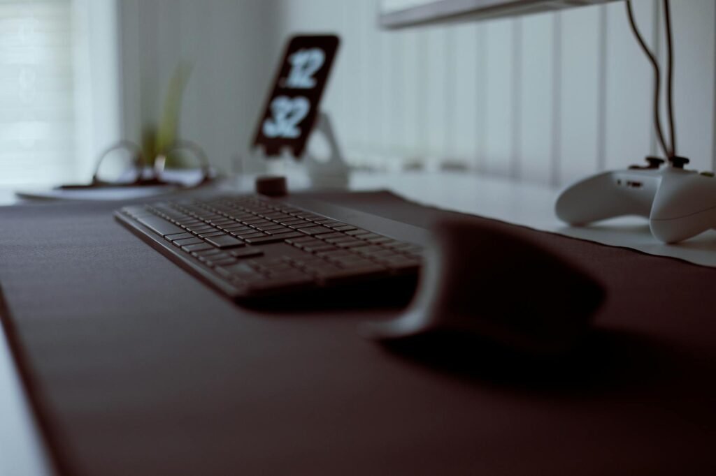 Keyboard and mouse positioned directly in front of the main monitor